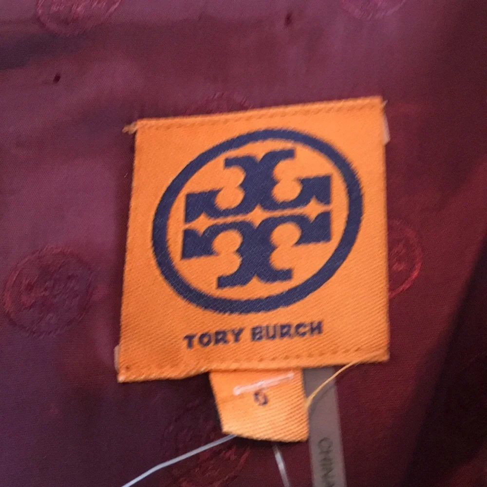Tory Burch victory dress.NWT. In dark‎ plum